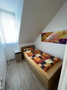 Postel nebo postele na pokoji v ubytování FEWO-Ammermann