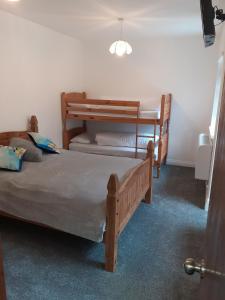 a bedroom with two bunk beds in a room at Southbay Room 2 in Bridlington