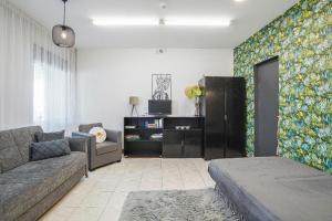 Et opholdsområde på Jaukus ir kokybiškas butas Panevėžio centre + 5 billeder