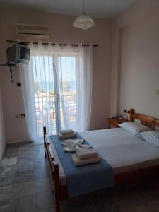 Postel nebo postele na pokoji v ubytování Golden Beach Sea View