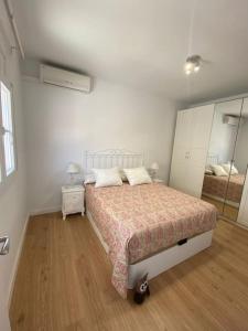 Vuode tai vuoteita majoituspaikassa Apartamento en Vilanova, Ático