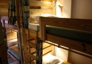 a couple of bunk beds in a room at Karibbik Haus Hostel in San Andrés