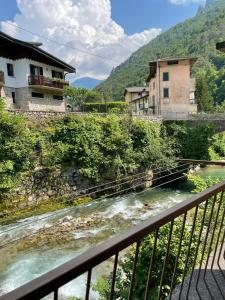 a view of a river from a balcony at Relax sul Brembo - Casa Vacanze in Olmo al Brembo