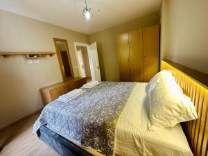 Voodi või voodid majutusasutuse CoastAL Hotel Shengjin toas