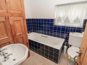 Koupelna v ubytování Bramble Corner Cottage + 11 fotografií