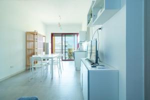 A kitchen or kitchenette at Appartamenti Craulo