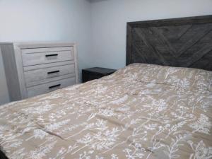 Postel nebo postele na pokoji v ubytování Dupont Beach House A