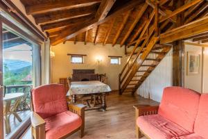 Posedenie v ubytovaní Apartamentos Rurales Los Picos de Redo