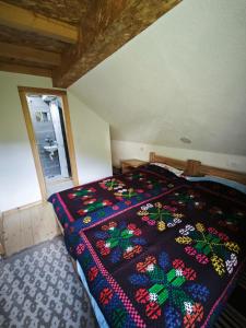 Voodi või voodid majutusasutuse Mini Garden toas