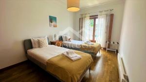 Giường trong phòng chung tại Casa do Sol +70 ảnh