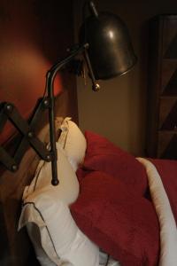 Cama ou camas em um quarto em Lumen7