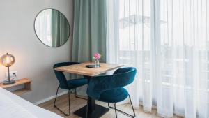 Posteľ alebo postele v izbe v ubytovaní Marienhof Apartments