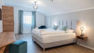 Posteľ alebo postele v izbe v ubytovaní Marienhof Apartments