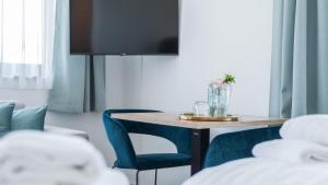 Posteľ alebo postele v izbe v ubytovaní Marienhof Apartments