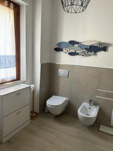 Kúpeľňa v ubytovaní Appartamento Sole Blu
