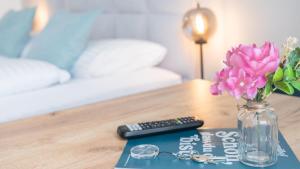 Posteľ alebo postele v izbe v ubytovaní Marienhof Apartments