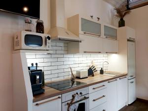 Köök või kööginurk majutusasutuses LOFT WAPITI