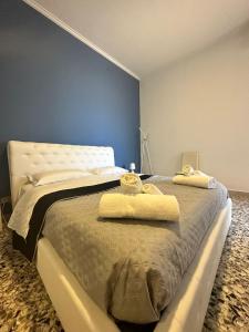 Postel nebo postele na pokoji v ubytování STABILE APARTMENT