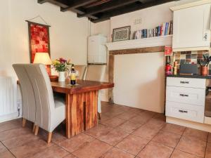 O bucătărie sau chicinetă la Tennant Cottage
