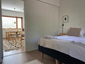 Postel nebo postele na pokoji v ubytování Aalto Apartments Sunila, Terrace House