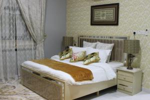 Кровать или кровати в номере آماسي و رواسي