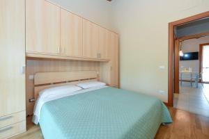 Ένα ή περισσότερα κρεβάτια σε δωμάτιο στο Apartment baglio degli ulivi +31 φωτογραφίες