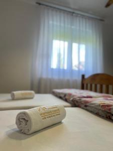 Postel nebo postele na pokoji v ubytování Apartmani Subotic