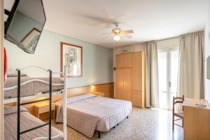 Postel nebo postele na pokoji v ubytování Hotel Itta