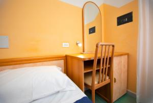 Postel nebo postele na pokoji v ubytování Hotel Montebello Riccione