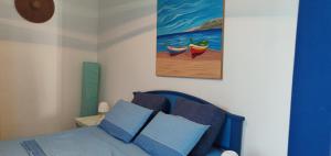 A bed or beds in a room at La Casa di Chico