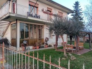 a house with a fence in front of it at Biogarden in Zelarino