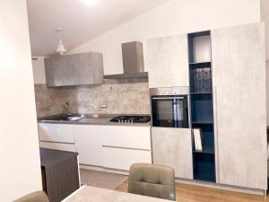 Cuina o zona de cuina de AlgheroLux -Free Secure Gated Parking for Cars and Motorbikes