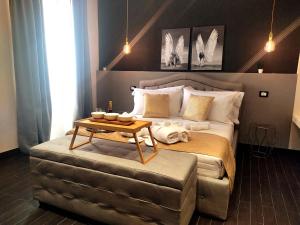 Postel nebo postele na pokoji v ubytování Ti Scialíi Suites Rooms and Relax