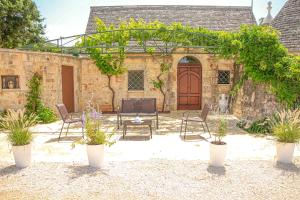 Zahrada ubytování TRULLI OLISTICI