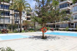 The swimming pool at or close to Acogedor Atlantis