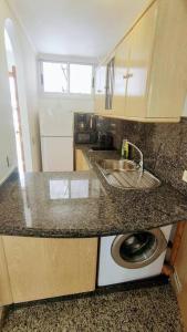 A kitchen or kitchenette at Acogedor Atlantis