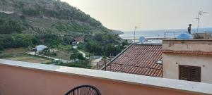 a view of the ocean from a building at Piricù Apartments in Castellammare del Golfo