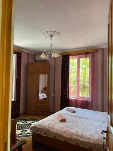 Postel nebo postele na pokoji v ubytování Irina