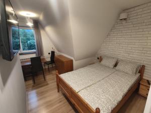 Postel nebo postele na pokoji v ubytování Apartament Sobczakówka 2