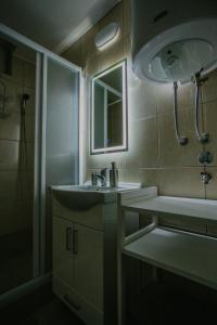 Koupelna v ubytování SPA apartments Kraljevo + 8 fotografií