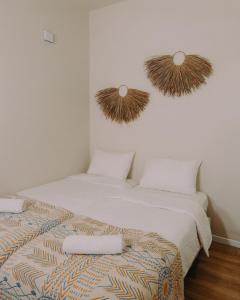 Postel nebo postele na pokoji v ubytování Hippie House היפי האוס
