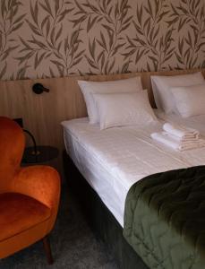 Postel nebo postele na pokoji v ubytování HOTEL GRACIAN