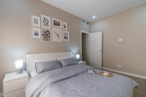 Katil atau katil-katil dalam bilik di Apartamento Salinas