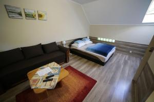Postel nebo postele na pokoji v ubytování Fónagy Apartmanok