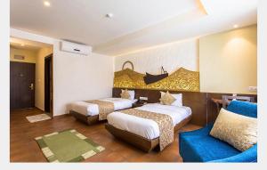 Posteľ alebo postele v izbe v ubytovaní Teeka Resort Suites & Spa