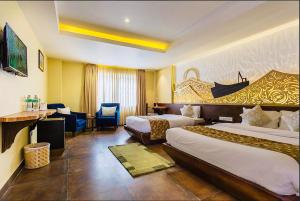 Posteľ alebo postele v izbe v ubytovaní Teeka Resort Suites & Spa