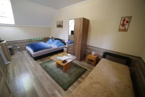 Posteľ alebo postele v izbe v ubytovaní Fónagy Apartmanok