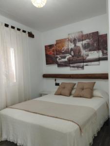 Ένα ή περισσότερα κρεβάτια σε δωμάτιο στο Apartamento EG17