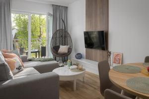 TV a/nebo společenská místnost v ubytování Porta Mare Apartments LuxView III