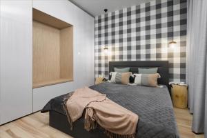 Postel nebo postele na pokoji v ubytování Porta Mare Apartments LuxView III